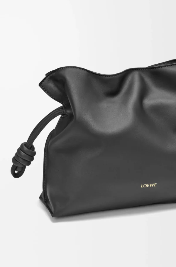 287de20f0ac0098b9fd7090777cd17fb-scaled-1.webp Medium Flamenco clutch in nappa calfskin