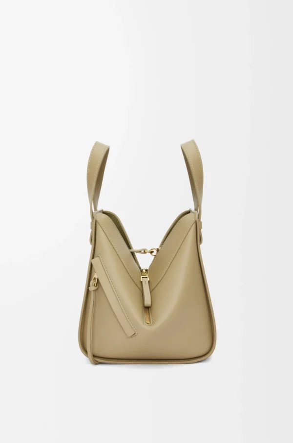 cfde1f41bccf32e7328caed7501a1dae-scaled-1.webp Compact Hammock bag in satin calfskin